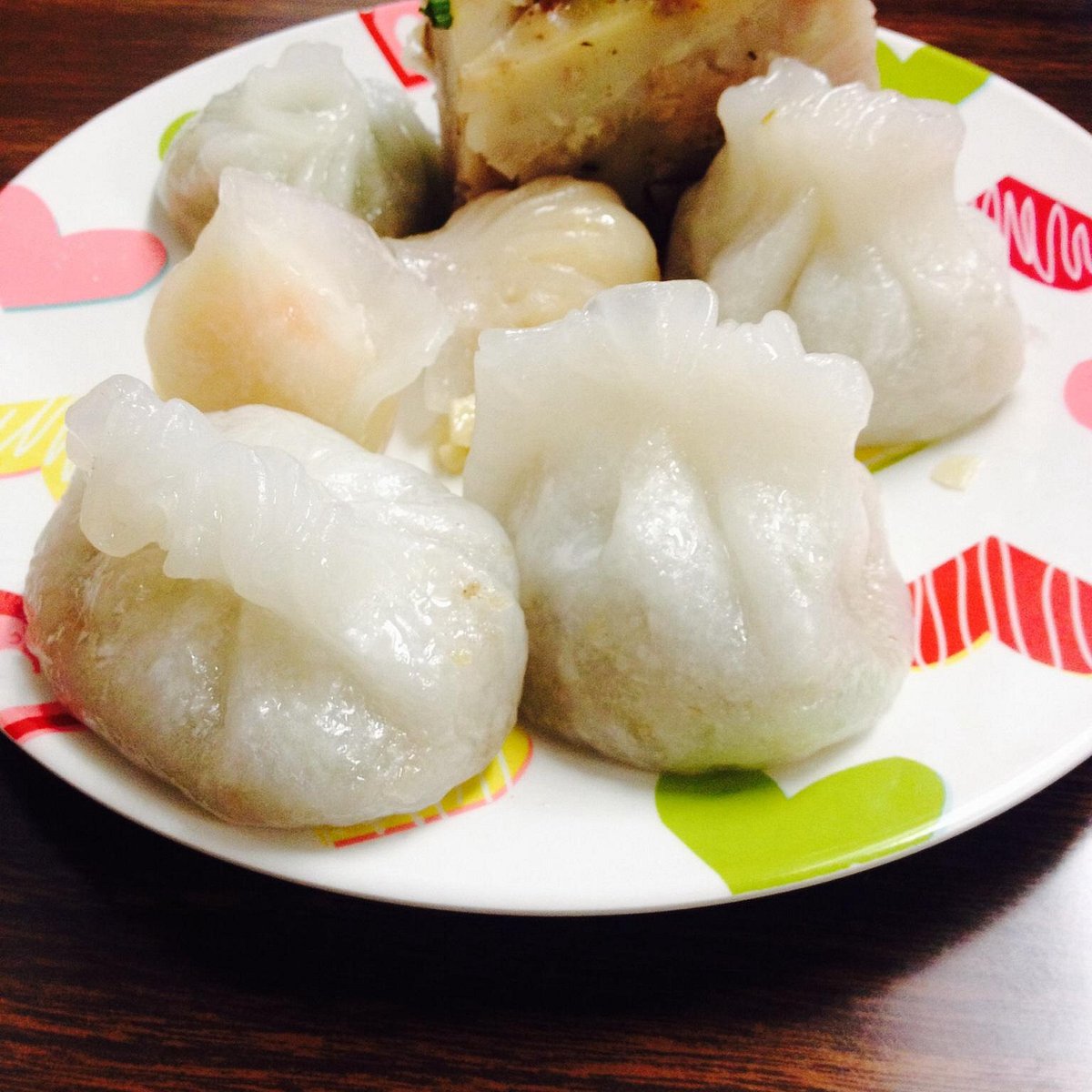 Good Luck Dim Sum signature dishes Har Gow (Shrimp Dumplings), Siu Mai (Pork Dumplings), Baked BBQ Pork Buns, Sesame Balls